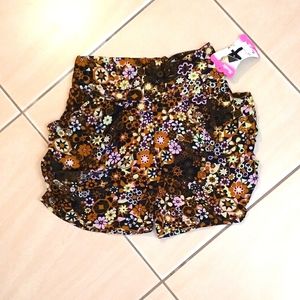 New, stretchy brown floral shorts.